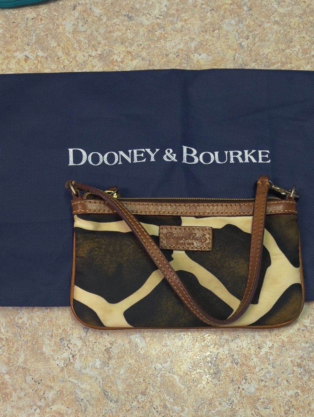 Dooney & Bourke Brown and Cream Giraffe Print Crossbody Wristlet GUC.